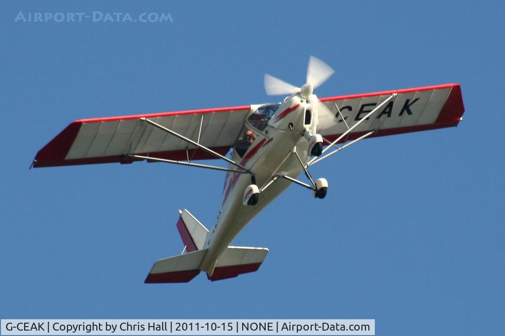 G-CEAK, 2006 Comco Ikarus C42 FB80 C/N 0606-6826, Barton based Ikarus over Oulton Park race course