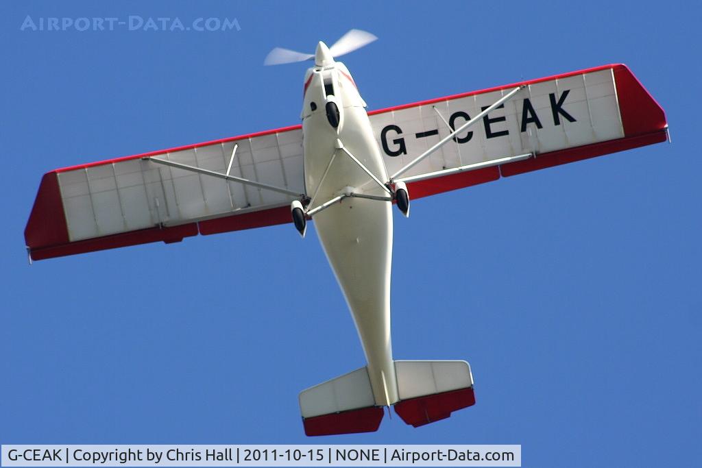 G-CEAK, 2006 Comco Ikarus C42 FB80 C/N 0606-6826, Barton based Ikarus over Oulton Park race course