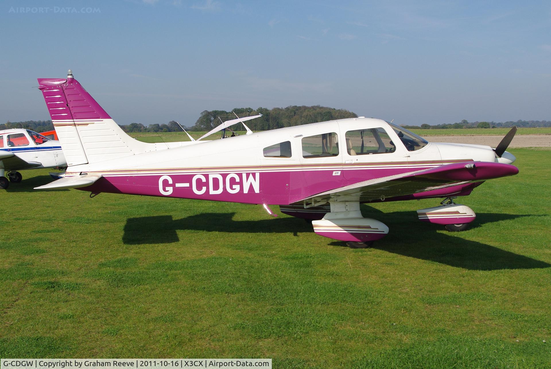 G-CDGW, 1979 Piper PA-28-181 Cherokee Archer II C/N 28-7990402, Parked in the sun.