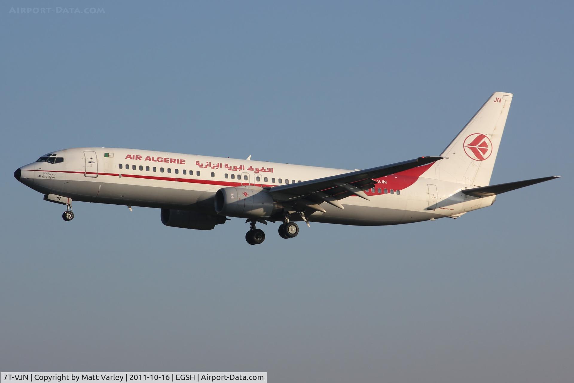 7T-VJN, 2001 Boeing 737-8D6 C/N 30206, Arriving at EGSH in early morning sun.