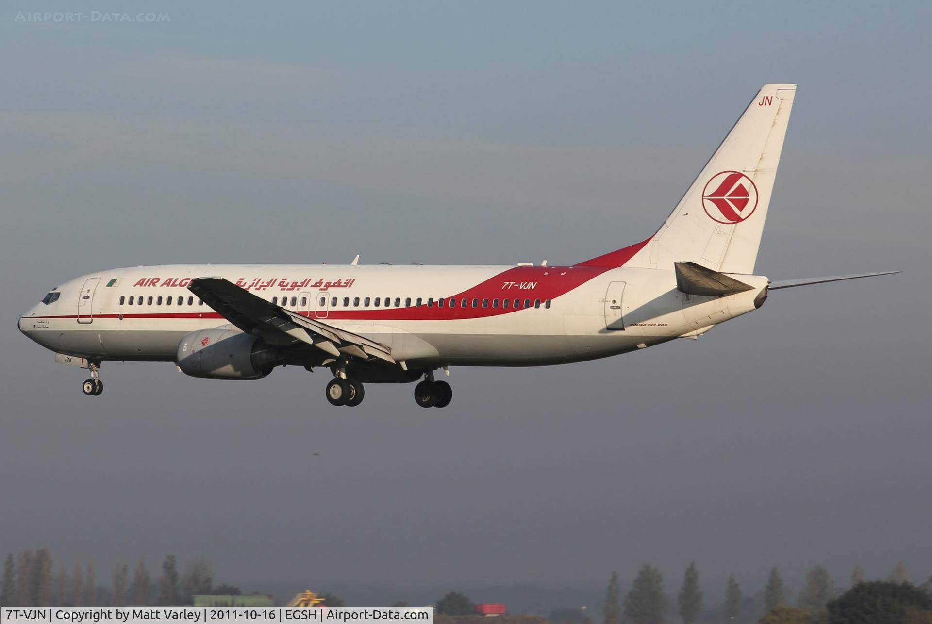 7T-VJN, 2001 Boeing 737-8D6 C/N 30206, Arriving at EGSH in the early morning sun.