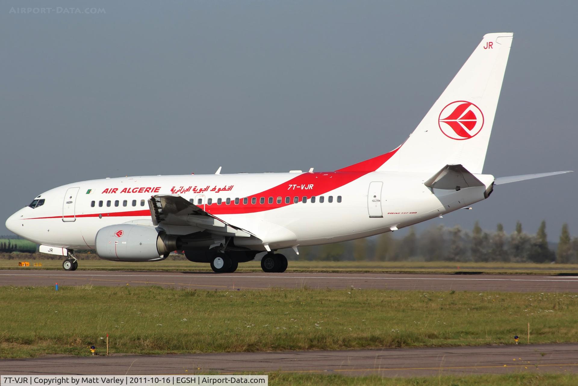 7T-VJR, 2002 Boeing 737-6D6 C/N 30545, Departing EGSH after spray.