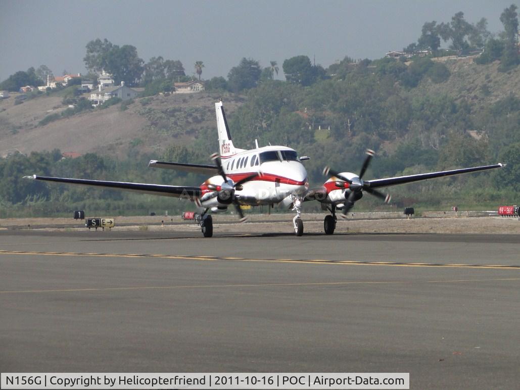 N156G, 1975 Beech E-90 King Air C/N LW-156, Taxiing to transient parking near static displays