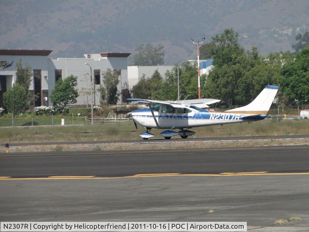 N2307R, 1964 Cessna 182G Skylane C/N 18255407, Rolling out after landing