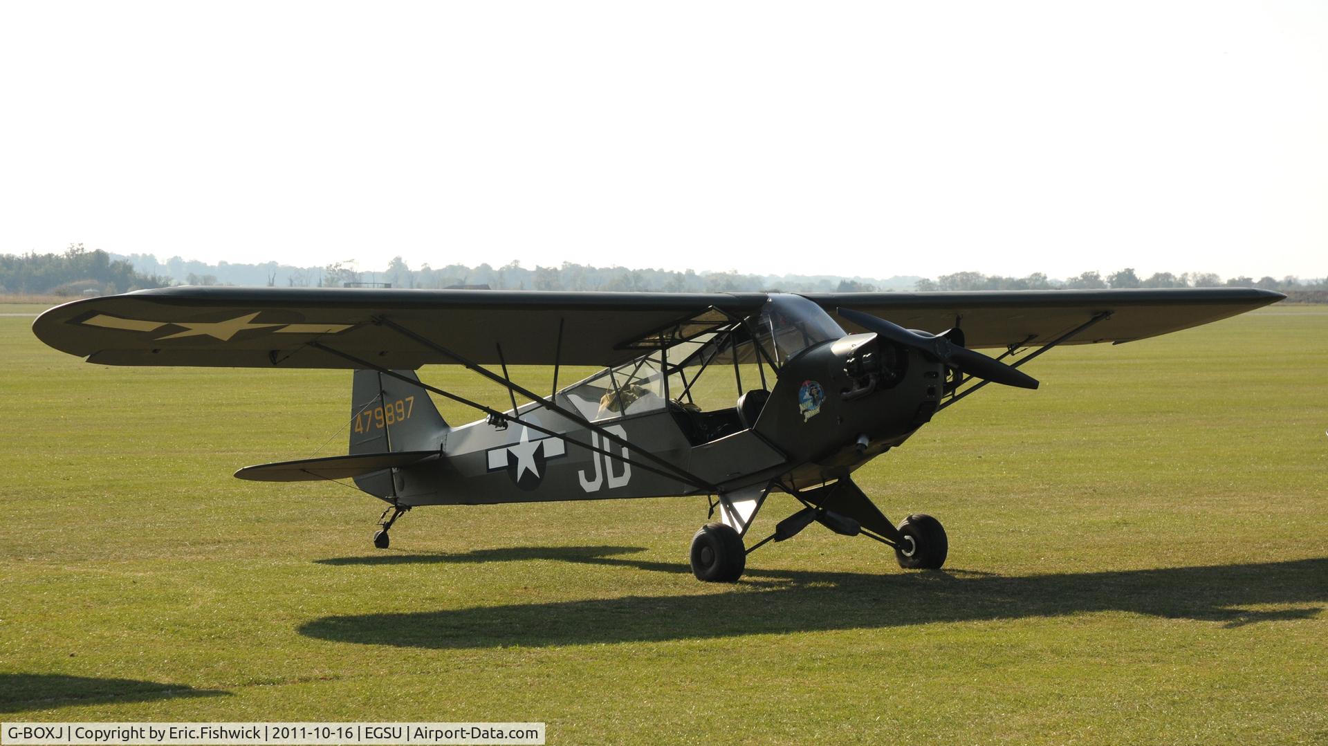 G-BOXJ, 1944 Piper L-4H Grasshopper (J3C-65D) C/N 12193, 3. 479897 at Duxford Autumn Air Show, October, 2011