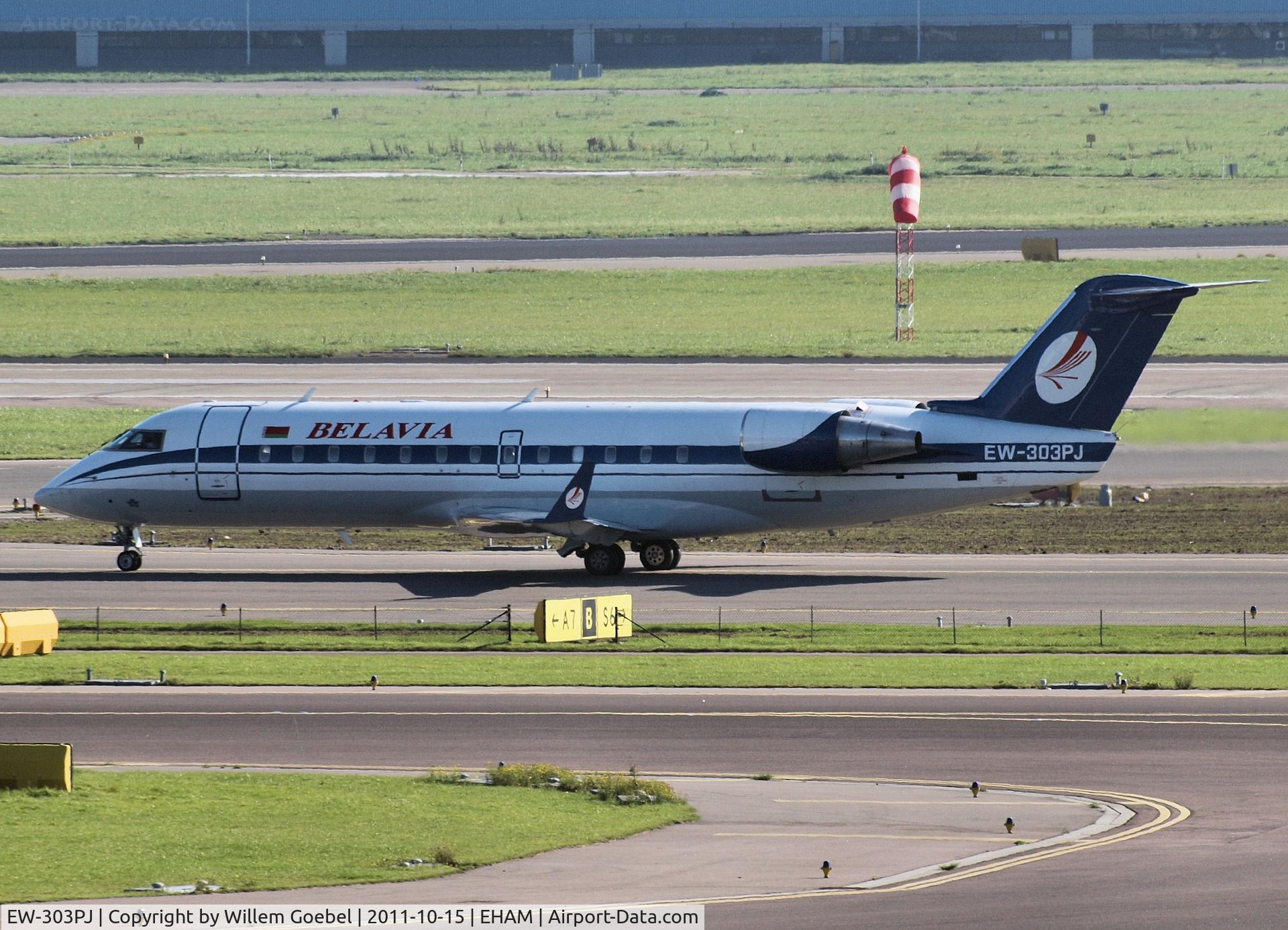 EW-303PJ, 2000 Canadair CRJ-200LR (CL-600-2B19) C/N 7436, Taxi to the runway of Schiphol Airport