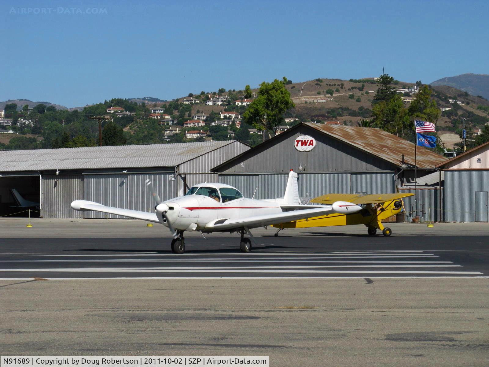 N91689, 1946 North American Navion (NA-145) C/N NAV-4-431, 1946 North American NAVION, Continental E-225 upgrade, Young Eagles Flight, taking the active