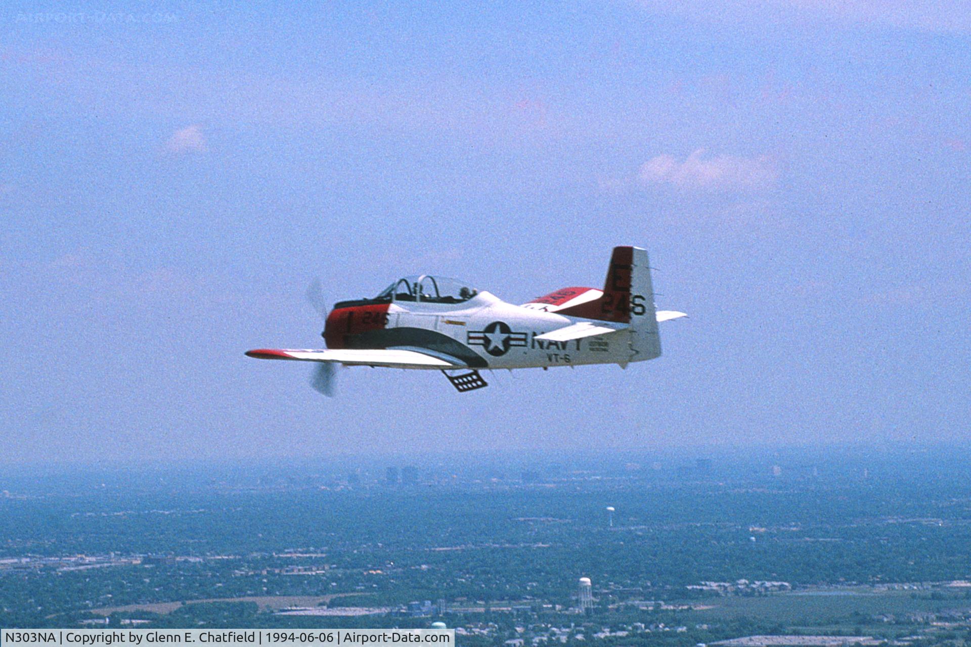 N303NA, 1954 North American T-28B C/N 137808, Flying over the Chicago area, seen from the turret position of a TBM-3