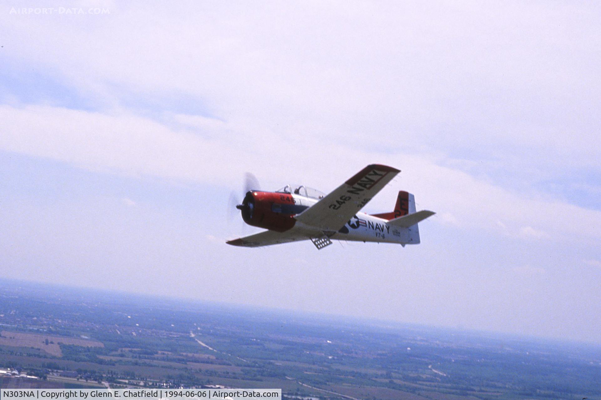 N303NA, 1954 North American T-28B C/N 137808, Flying over the Chicago area, seen from the turret position of a TBM-3