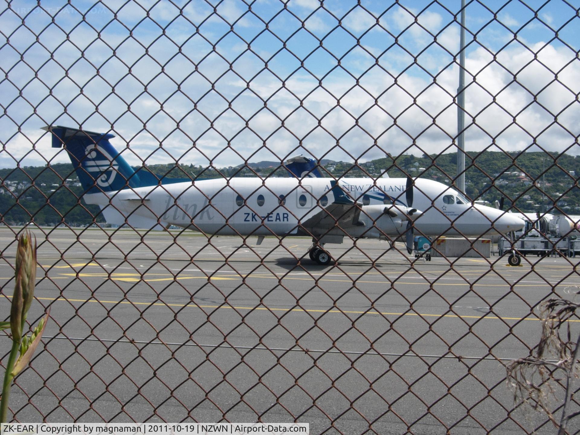 ZK-EAR, 1999 Beech 1900D C/N UE-388, Sorry about the fence!