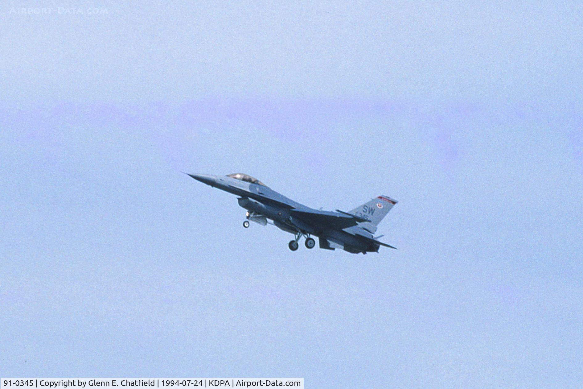 91-0345, 1991 General Dynamics F-16CM Fighting Falcon C/N CC-43, F-16C fly by. Long distance shot with 1000mm lens