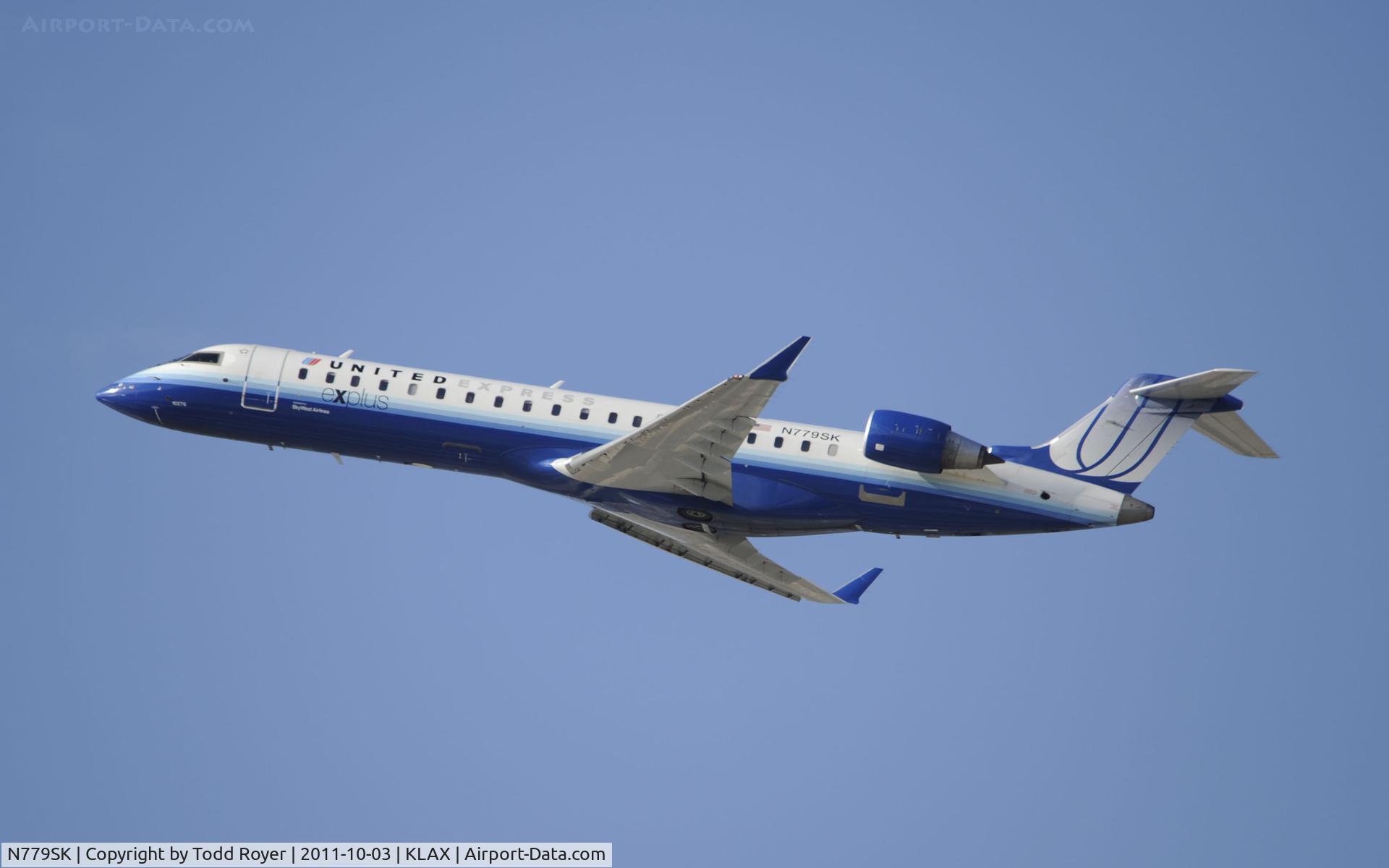 N779SK, 2009 Bombardier CRJ-702 (CL-600-2C10) Regional Jet C/N 10276, Departing LAX