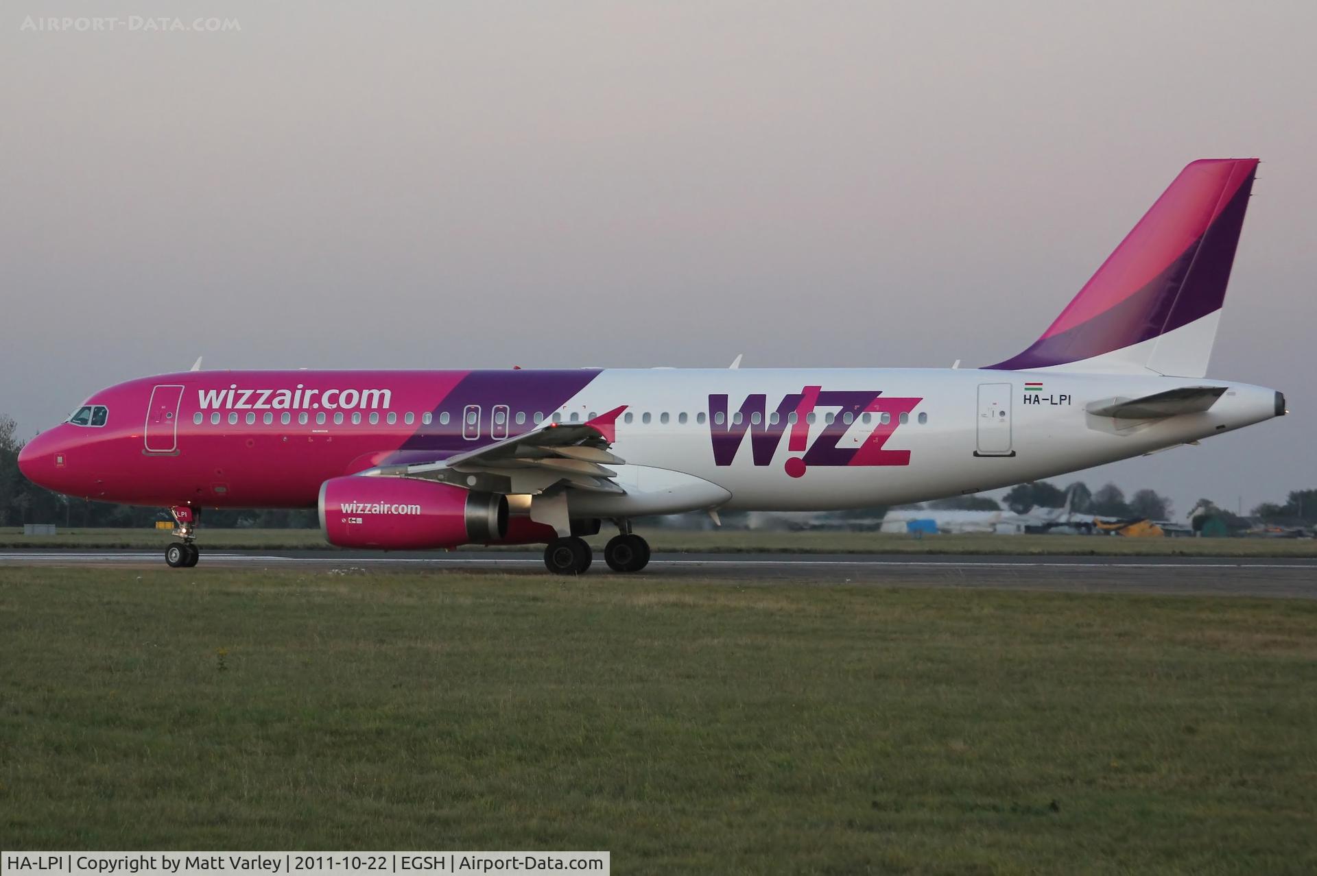 HA-LPI, 2006 Airbus A320-232 C/N 2752, Departing EGSH after spray.