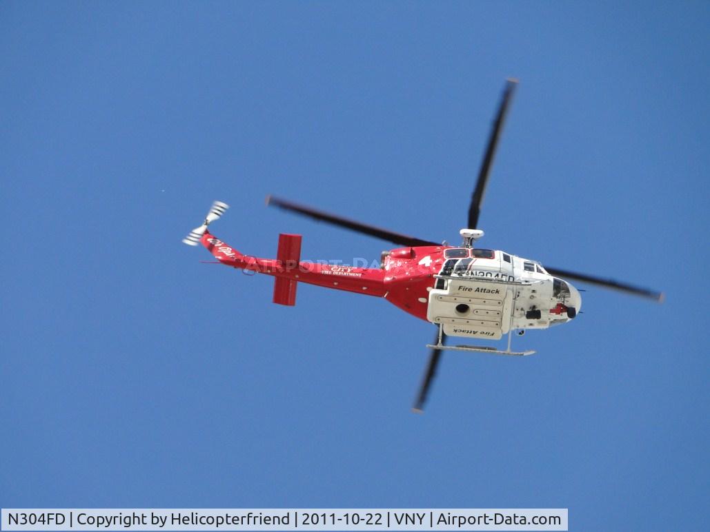 N304FD, 1999 Bell 412EP C/N 36229, Travelling westbound
