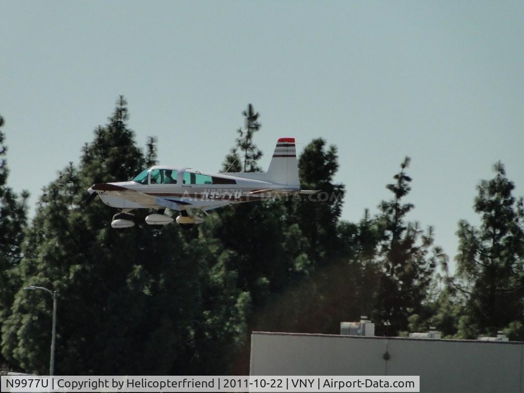 N9977U, Grumman American AA-5A Cheetah C/N AA5A0377, Taking off from runway 16R