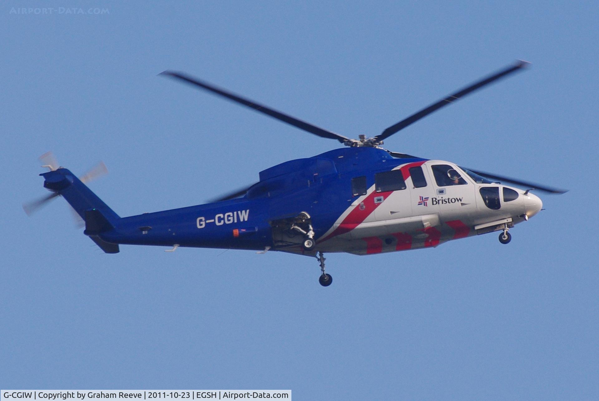G-CGIW, 2009 Sikorsky S-76C C/N 760773, Over head at Norwich.