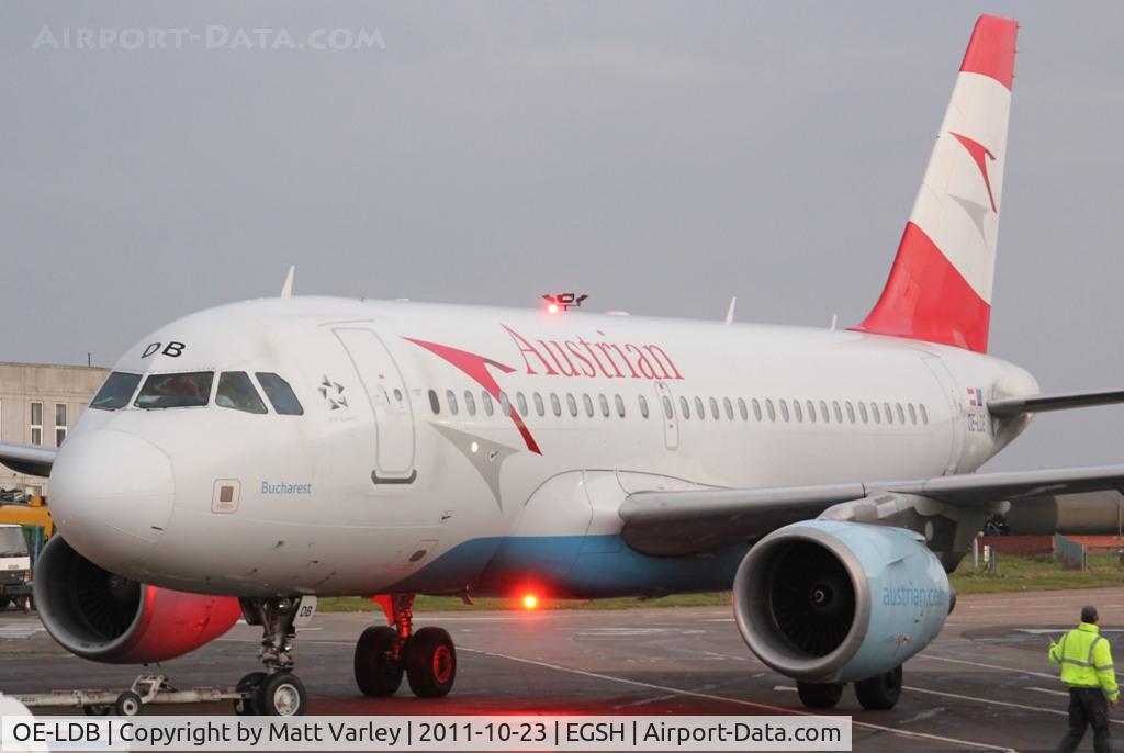 OE-LDB, 2004 Airbus A319-112 C/N 2174, Being towed into the Air Livery hanger for spray.