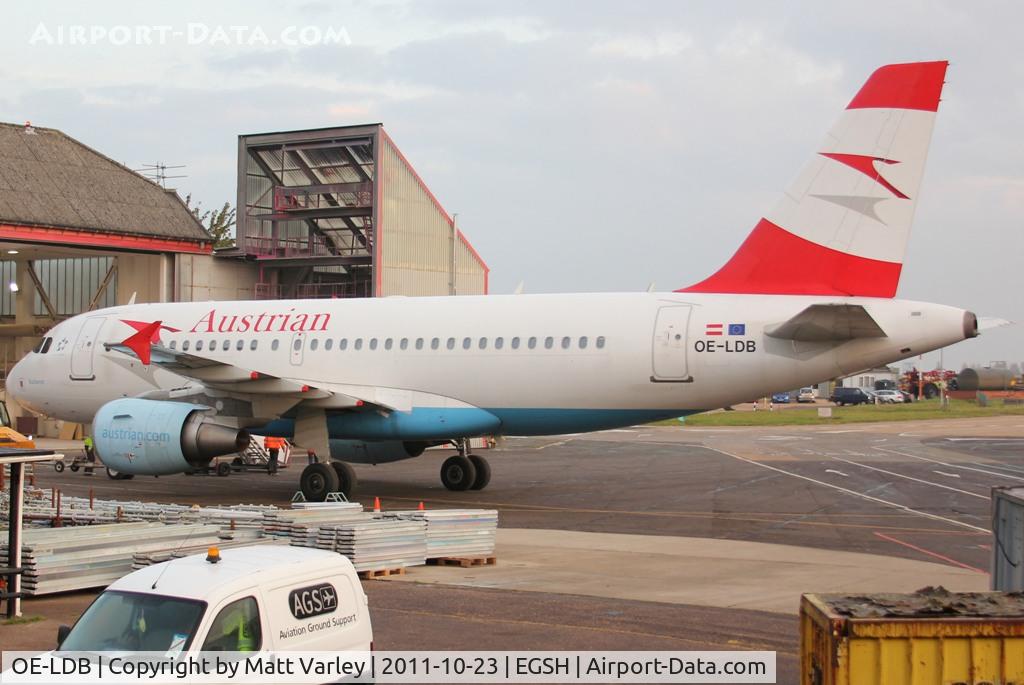 OE-LDB, 2004 Airbus A319-112 C/N 2174, Being towed into the Air Livery hanger for spray.