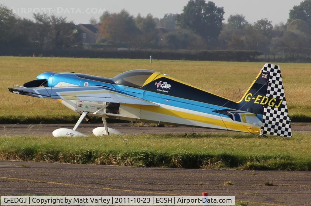 G-EDGJ, Zivko Edge 360 C/N MCK002, Sat on the north side of EGSH for a meet the tower fly in.
