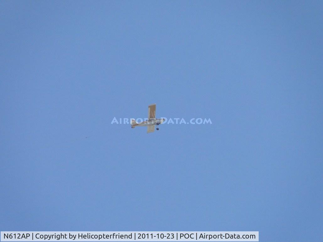 N612AP, 1978 Bellanca 8GCBC C/N 286-78, Banner puller east of Brackett, flying southbound