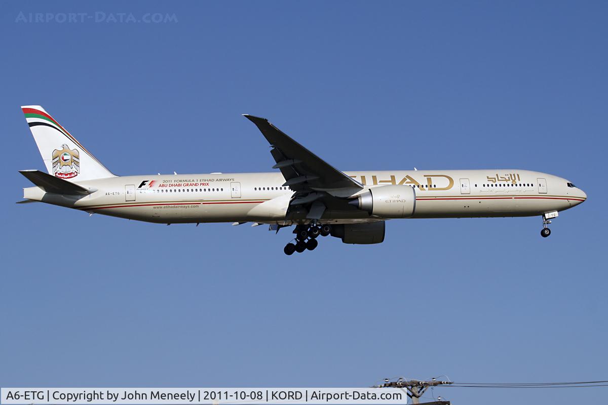 A6-ETG, 2011 Boeing 777-3FX/ER C/N 39681, Short final for 10
