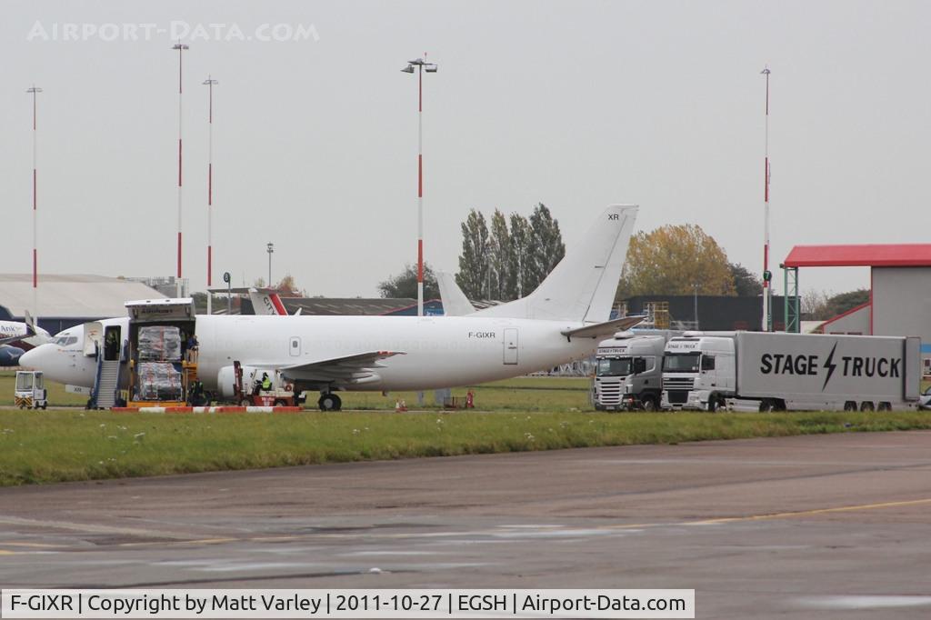 F-GIXR, 1992 Boeing 737-3H6 C/N 27125, Sat on stand 7 unloading stage equipment for Coldplay's gig at the UEA.