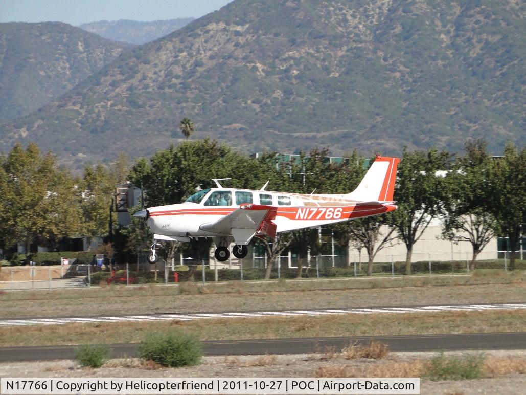 N17766, 1977 Beech A36 Bonanza 36 C/N E-1023, Almost down on runway 26L
