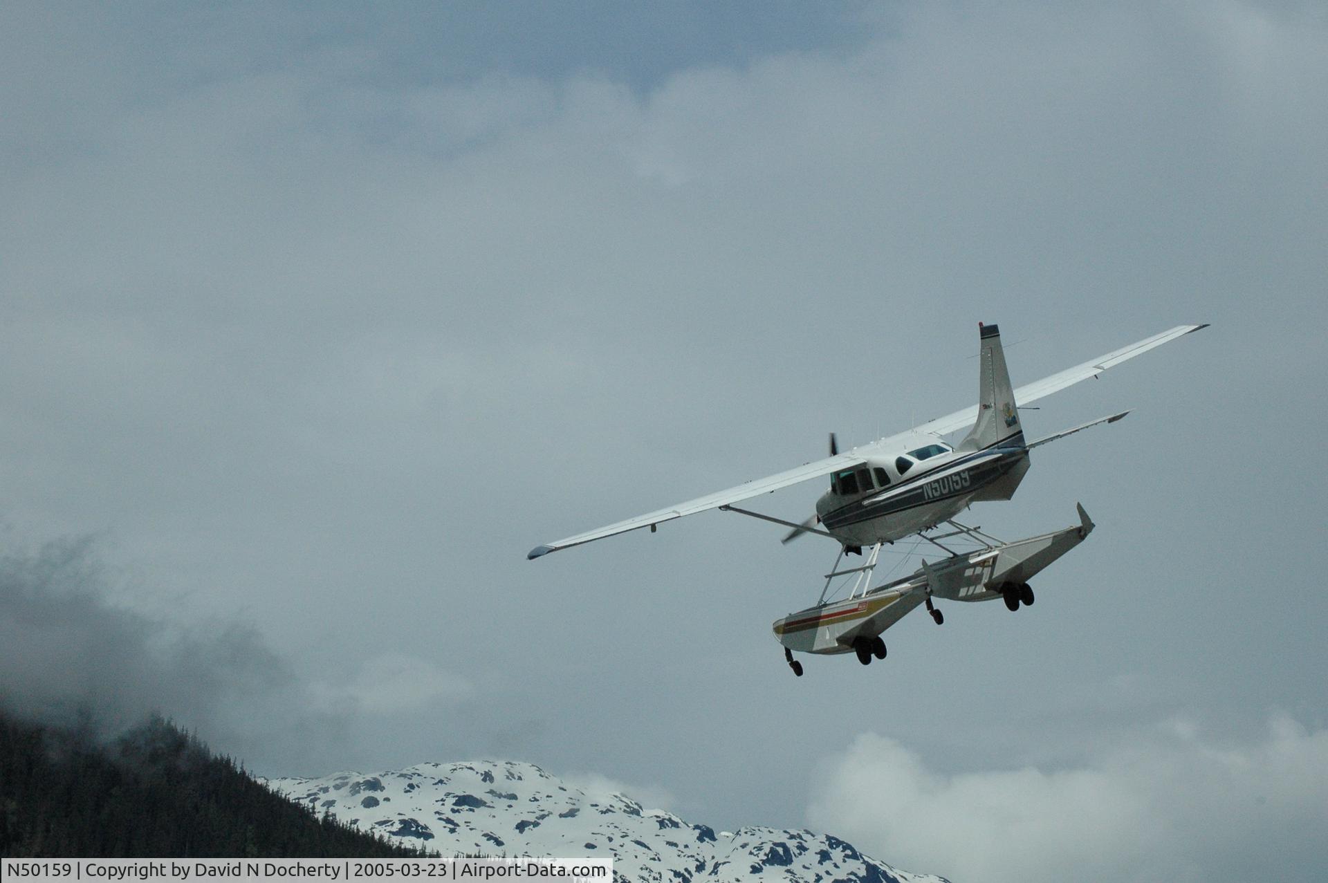 N50159, 1972 Cessna U206F Stationair C/N U20601907, Sunrise Aviation Pilot/Owner airborne from a gravel strip in NW British Columbia in his 1972 Cessna 206.