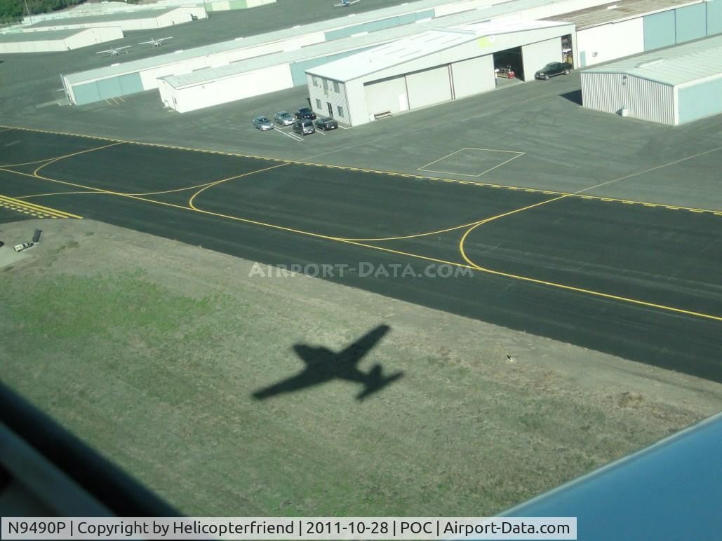 N9490P, 1971 Piper PA-24-260 C/N 24-5007, Shadow of ship seen between runway 26R and taxiway November