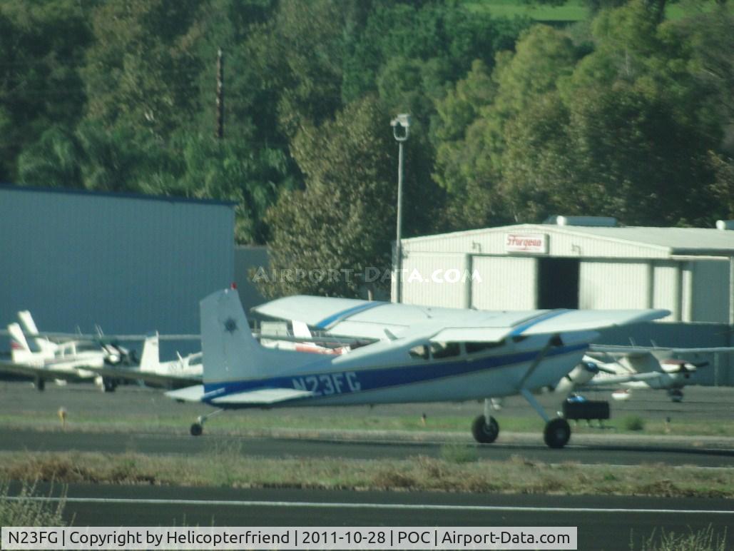 N23FG, 1980 Cessna 185 Skywagon C/N 18504035, Taking off on runway 26L while our ship (N9490P) is in the turn out doing preflights