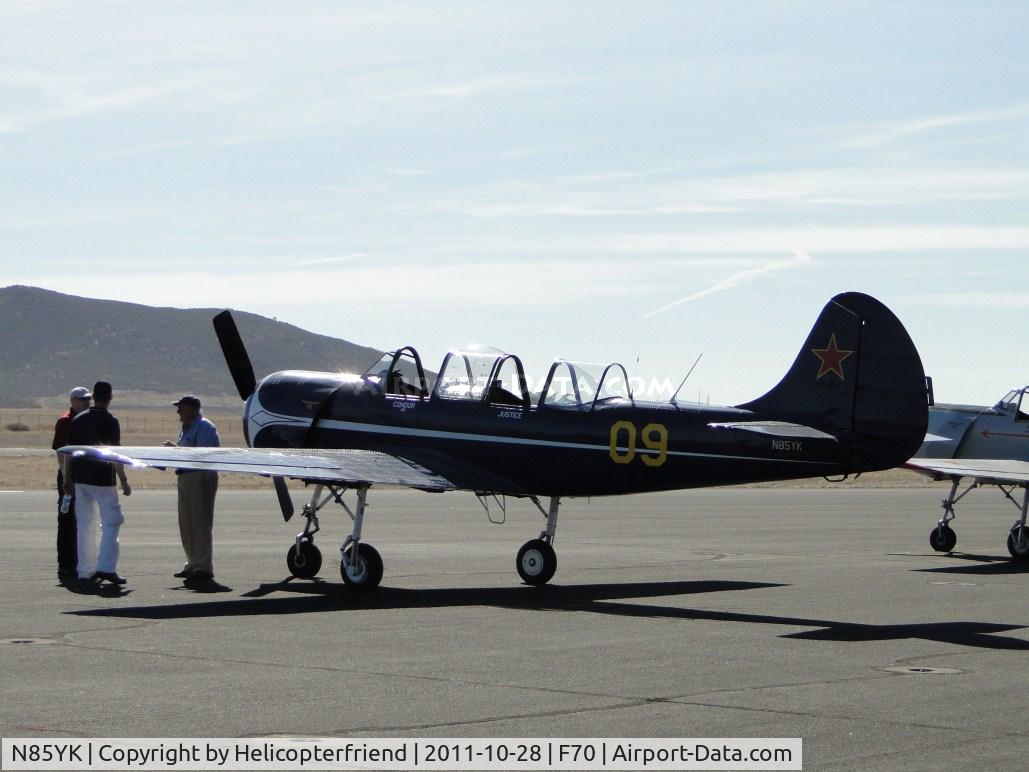 N85YK, 1985 Yakovlev Yak-52 C/N 855609, Parked with Yak N5287