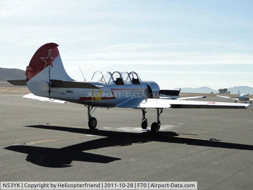 N53YK, 1986 Yakovlev Yak-52 C/N 866614, Parked south of transient parking