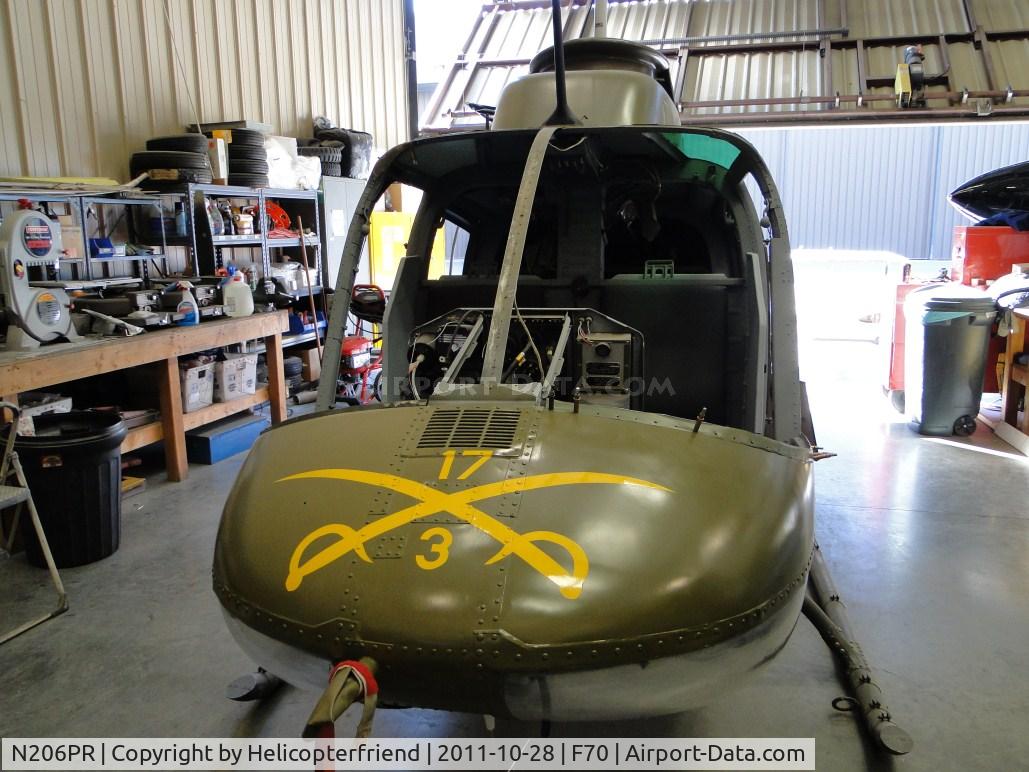 N206PR, Bell OH-58A Kiowa C/N 16888R, Parked inWings and Rotors Air Museum in hangar 7 and being restore