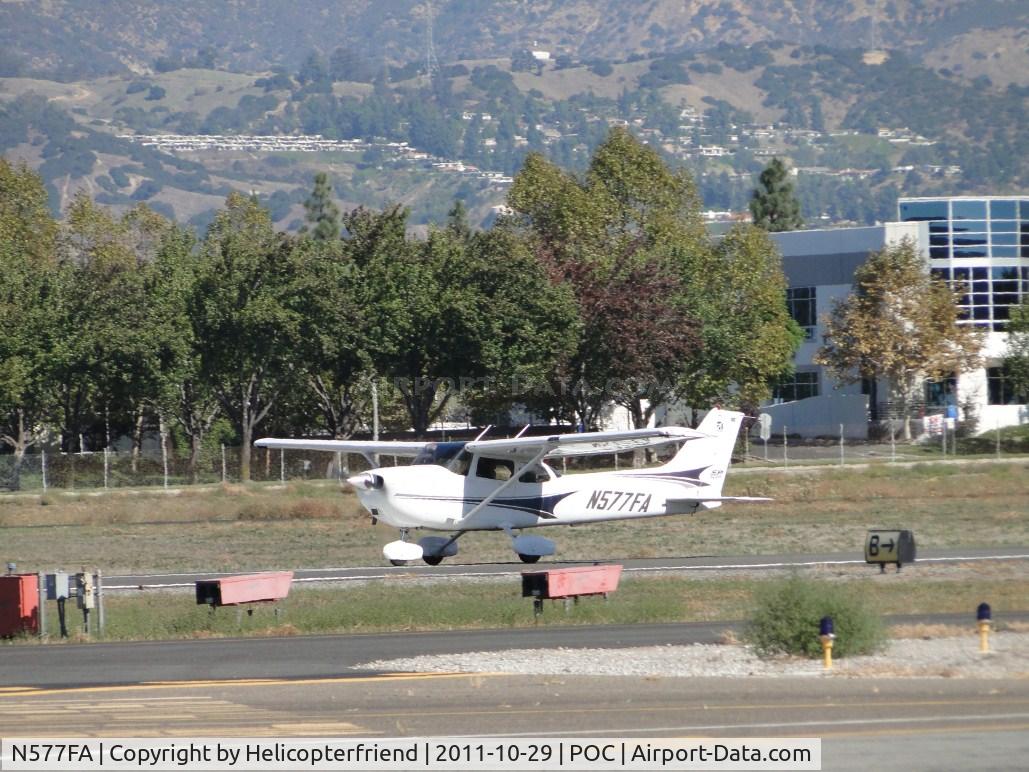 N577FA, 2004 Cessna 172S C/N 172S9577, Rolling westbound on runway 26L