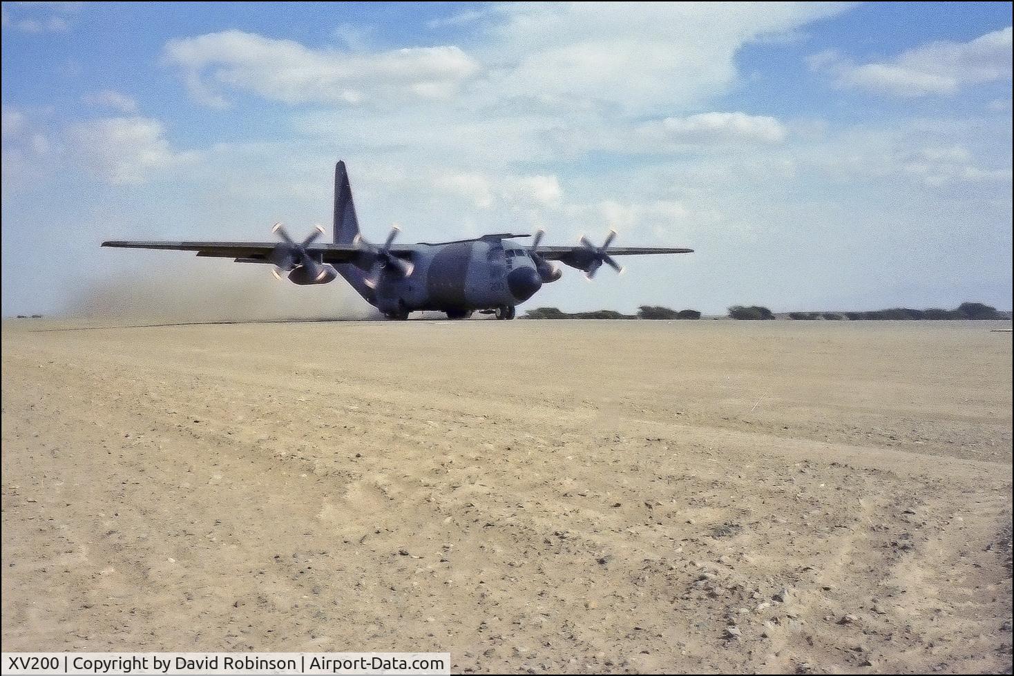 XV200, 1967 Lockheed C-130K Hercules C.1 C/N 382-4223, Landing strip Sultanate of Oman 1983.  Minox 35EL.