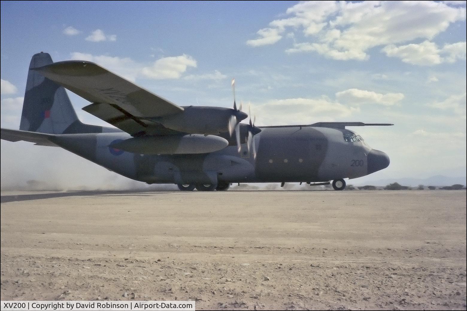 XV200, 1967 Lockheed C-130K Hercules C.1 C/N 382-4223, Landing strip Sultanate of Oman 1983.  Minox 35EL.