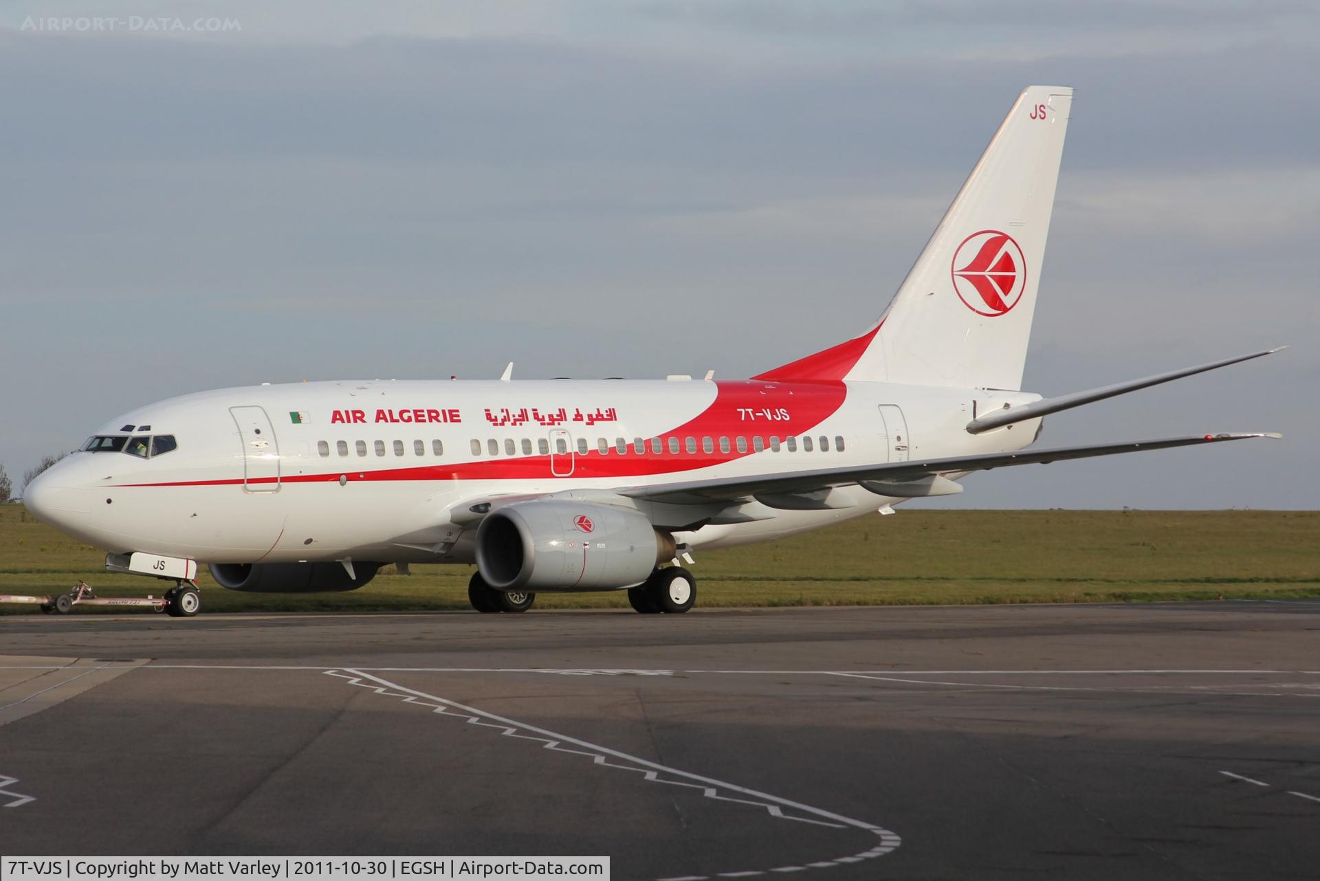 7T-VJS, 2002 Boeing 737-6D6 C/N 30210, Being towed from Air Livery after spray into new scheme.