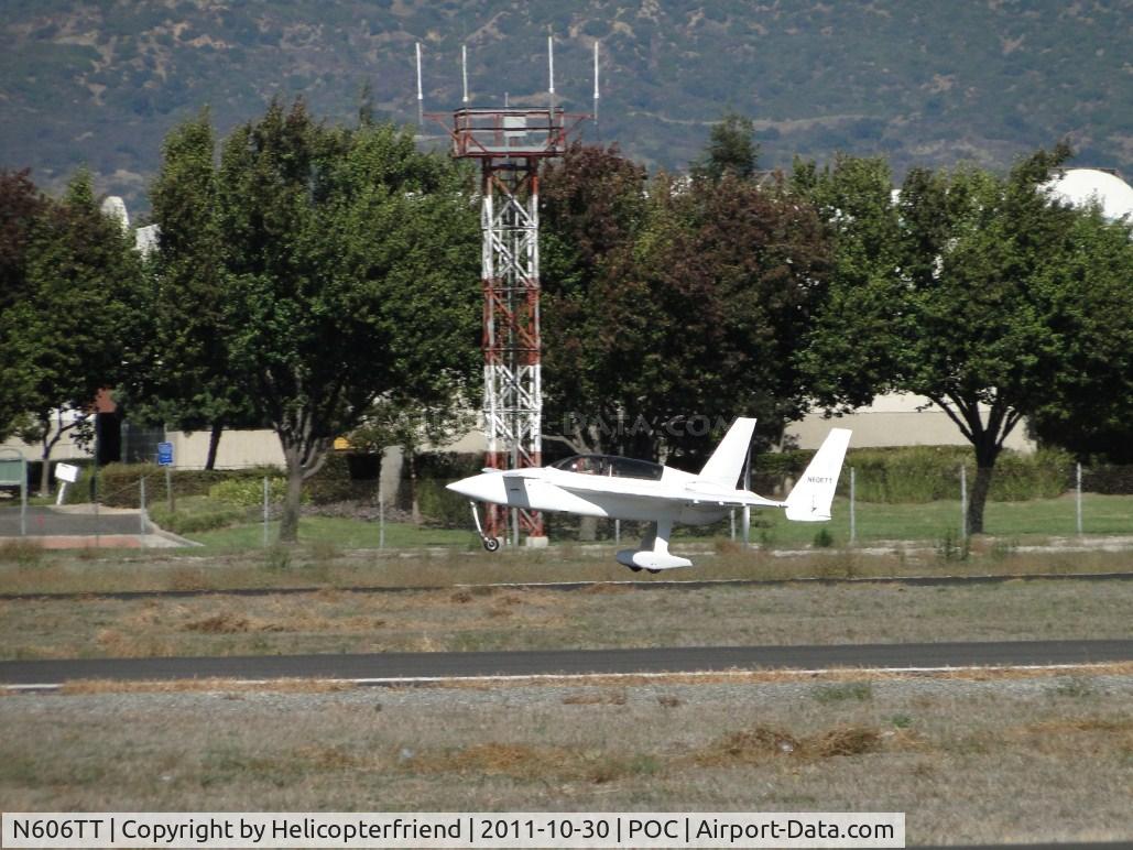 N606TT, 1985 Rutan Long-EZ C/N 274, After recieving permission to cross runway 26L to 26R and was cleared for take off, starting to lift off