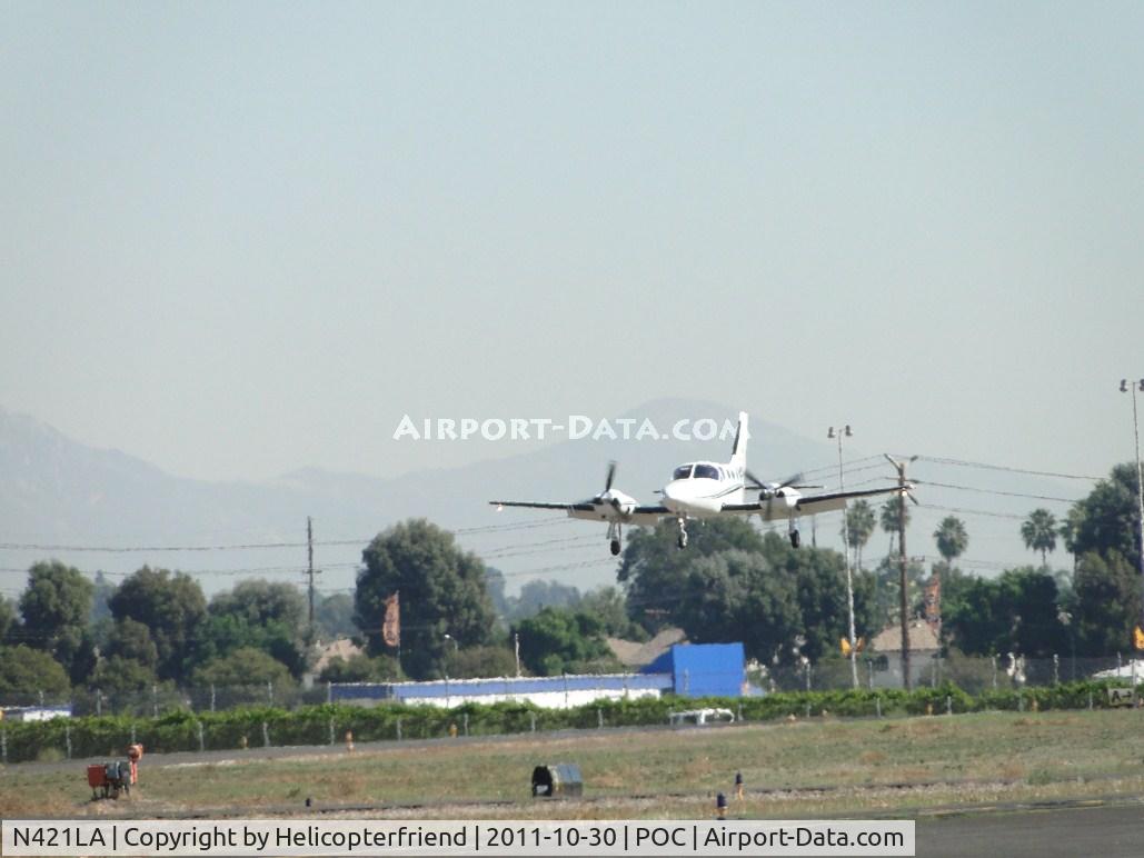 N421LA, Cessna 421C Golden Eagle C/N 421C1219, On final for runway 26L