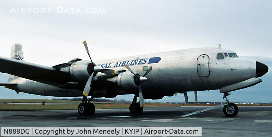 N888DG, 1956 Douglas VC-118A Liftmaster (DC-6A) C/N 44675, Parked at KYIP - Nov. 1990