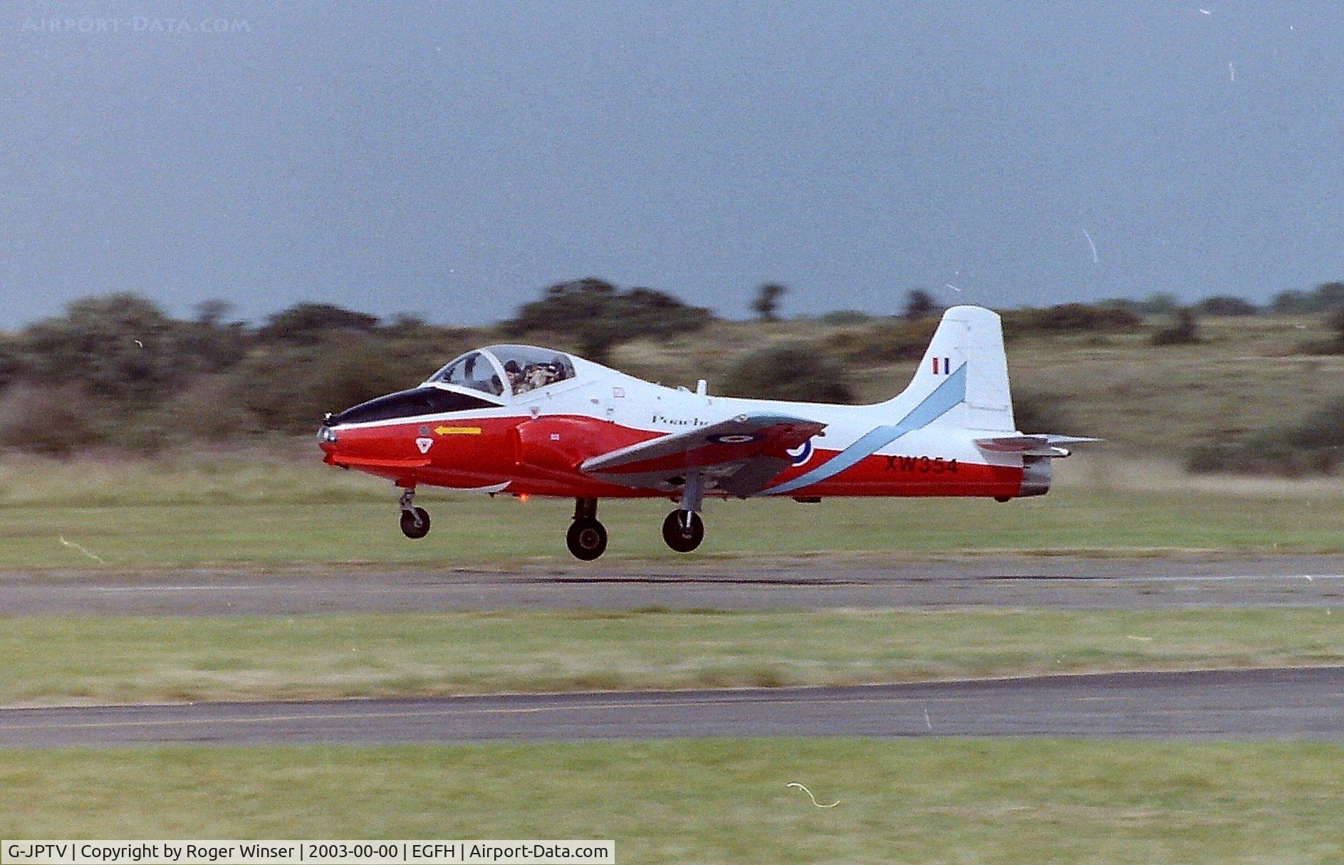 G-JPTV, 1971 BAC 84 Jet Provost T.5A C/N EEP/JP/1005, Marked XW354 representing the lead aircraft of the Poachers aerobatic team in the mid 1970's. Actually the aircraft was XW355 in RAF service. Departing Swansea Airport for solo aerobatic practice in summer 2003.