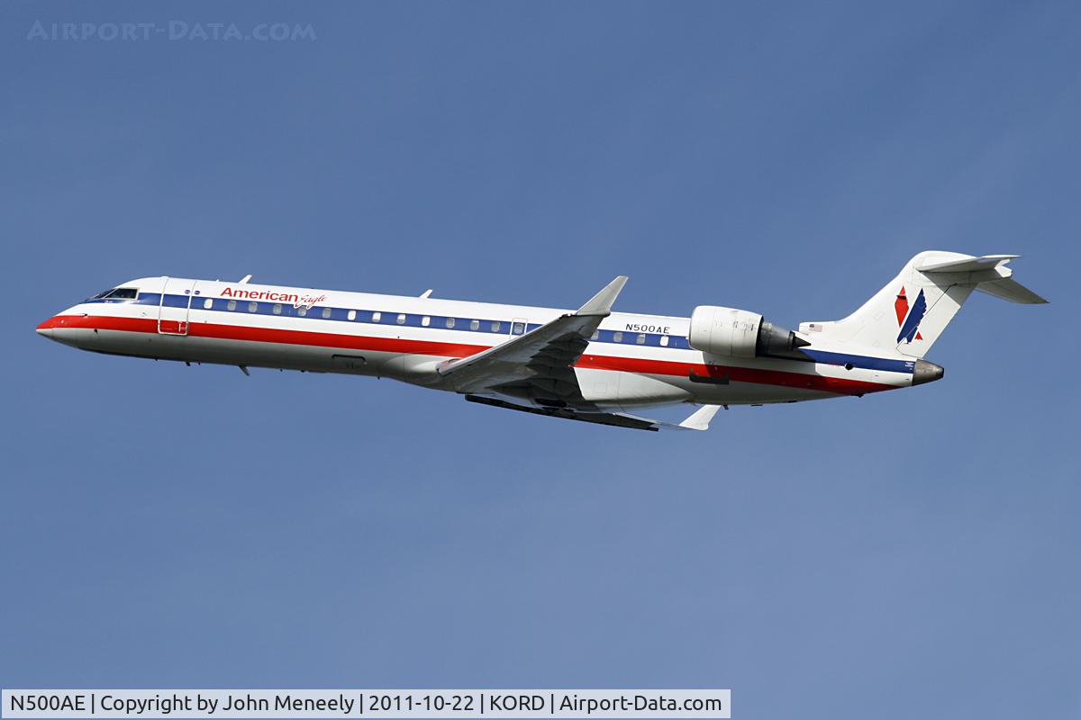 N500AE, 2001 Bombardier CRJ-701 (CL-600-2C10) Regional Jet C/N 10025, Climbing out from 22L