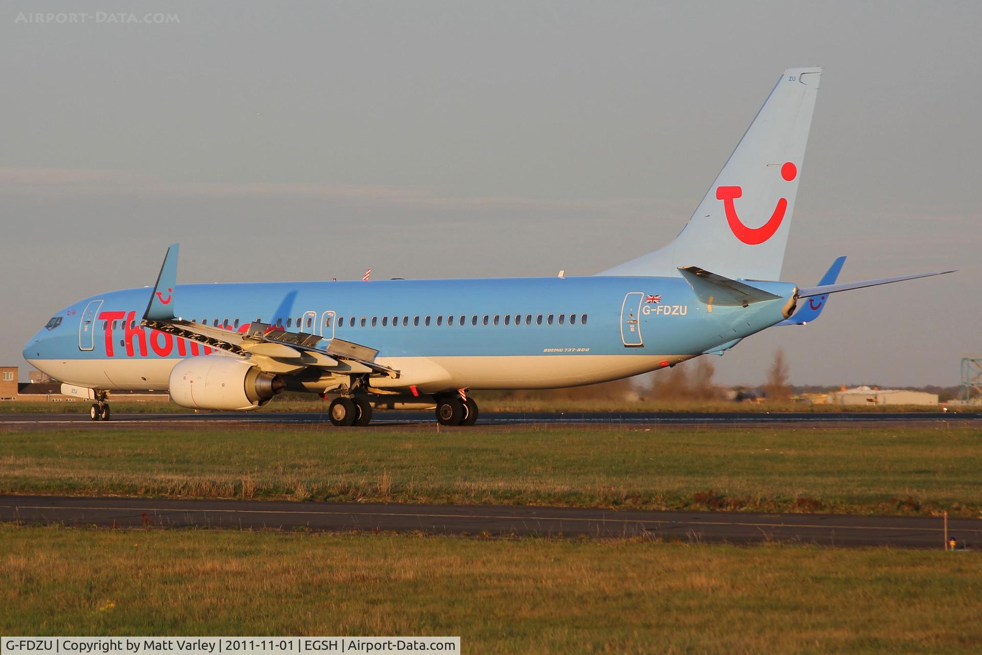 G-FDZU, 2011 Boeing 737-8K5 C/N 37253, Arriving at EGSH in the late evening sun.