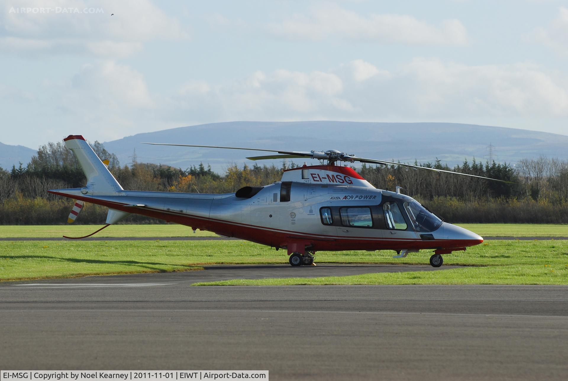 EI-MSG, 2007 Agusta A-109E Power C/N 11692, Parked on the apron at Weston.
