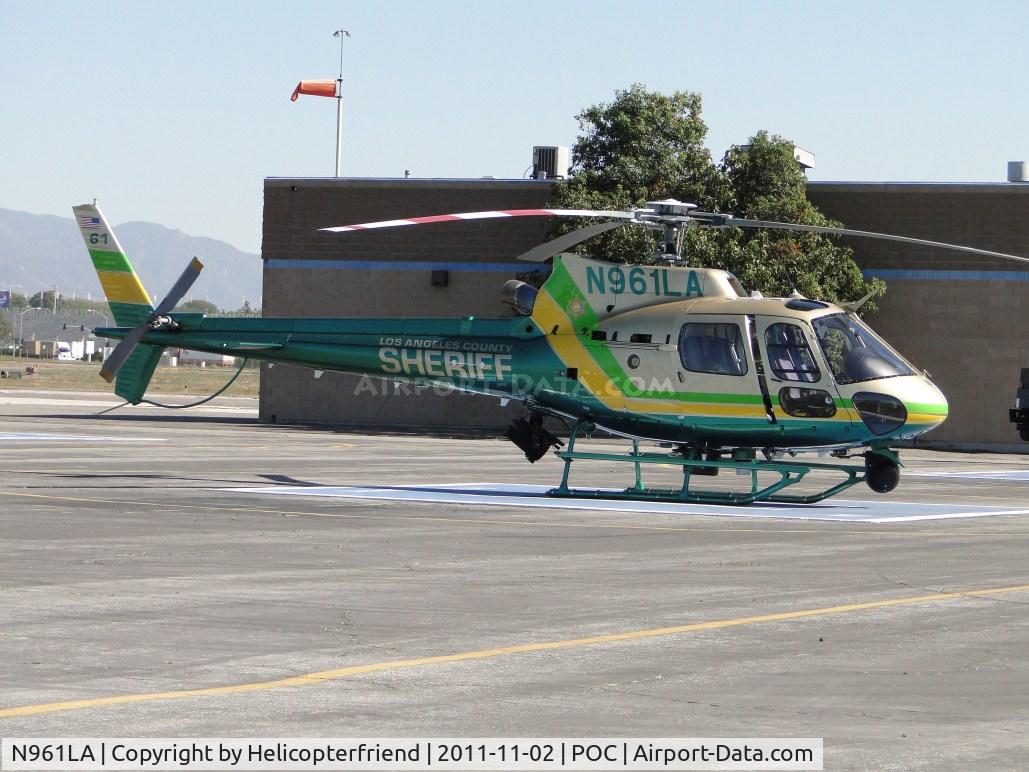N961LA, 2011 Eurocopter AS-350B-2 Ecureuil Ecureuil C/N 7129, Parked on LA County Air Ops helipad 6 facing the hanger on an extremely windy day