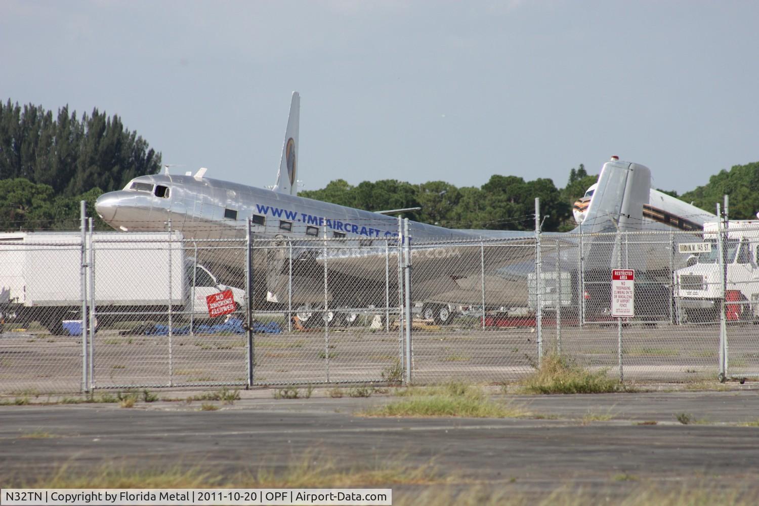 N32TN, 1951 Douglas VC-117D Skytrain C/N 43301, Douglas C-117D.  This was the best that I could get of this plane unfortunately - about 3 seperate fences in the way.  I am going to try to arrange an airfield tour here, once I get a better shot of this plane - this shot will be replaced