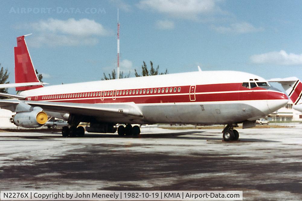 N2276X, 1959 Boeing 707-321F C/N 17602, Stored at MIA - faded Tampa Colombia logo on fin