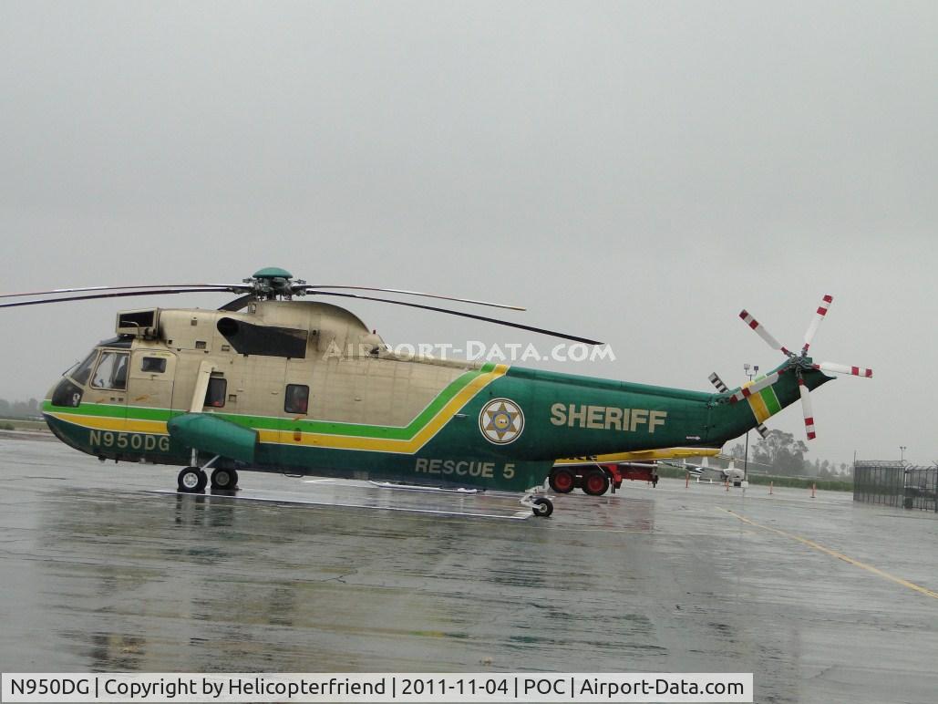 N950DG, Sikorsky UH-3H Sea King C/N 149724, Setting on the pad waiting for a call out in the rain