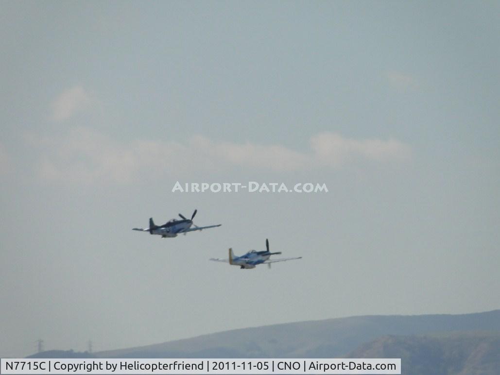 N7715C, 1944 North American P-51D C/N 44-84961A (124-44817), Both ships climbing out, landing gear retracted