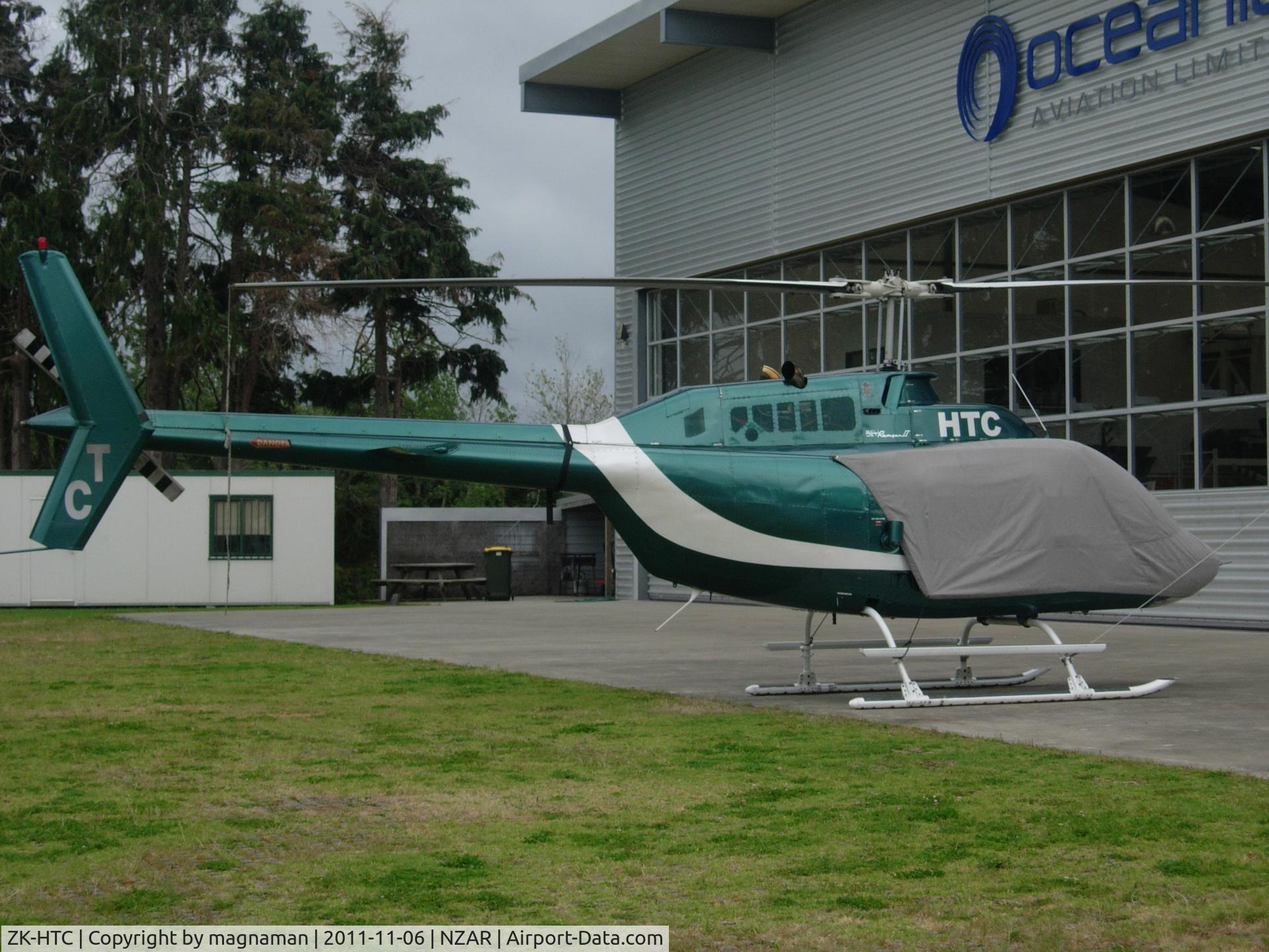 ZK-HTC, Bell 206B C/N 1659, A few dents in the side.